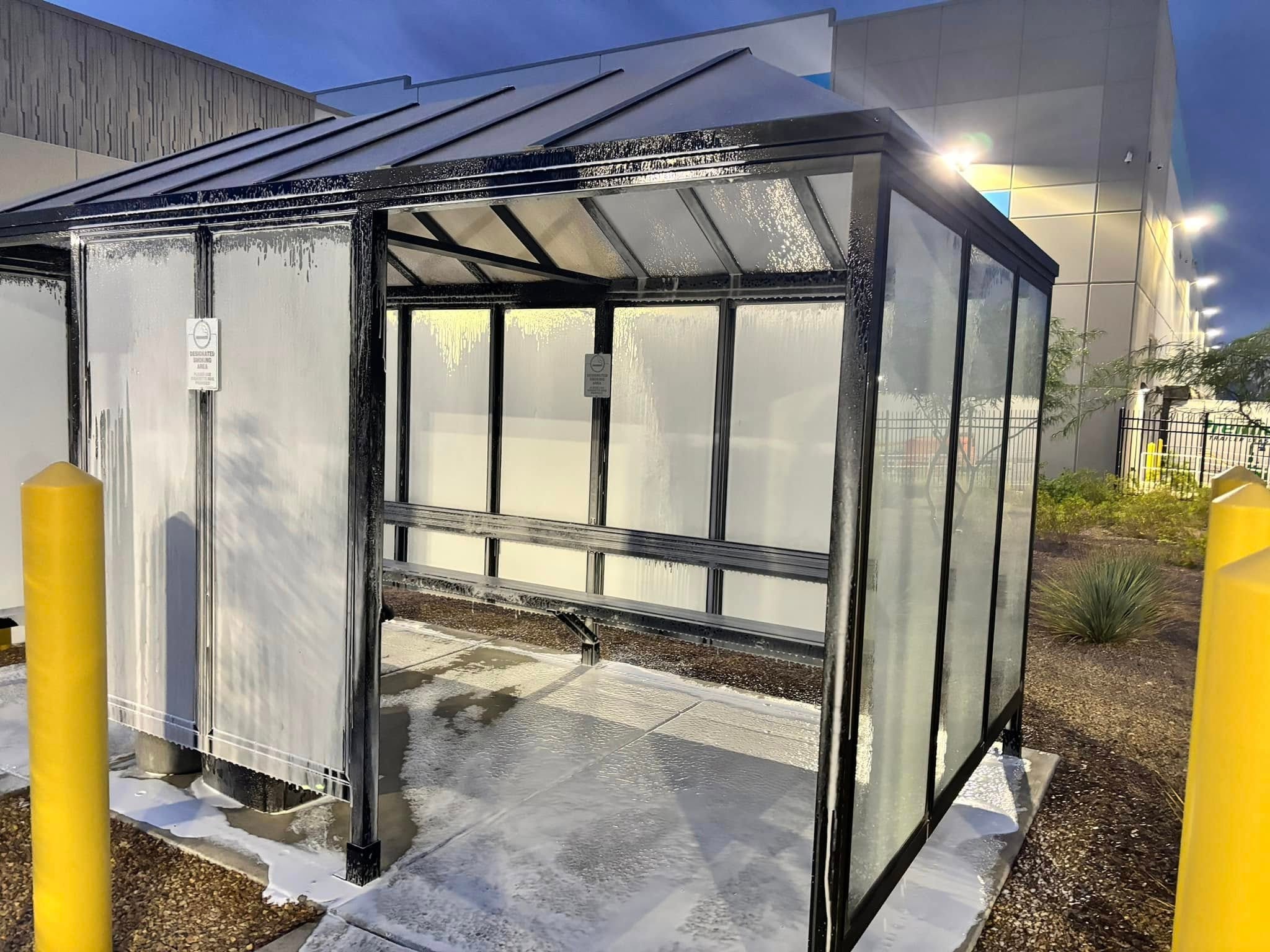 Bus shelter power wash
